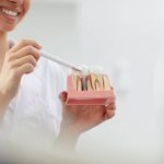 4 Signs It’s Time To Discuss Dental Implants With Your Dentist